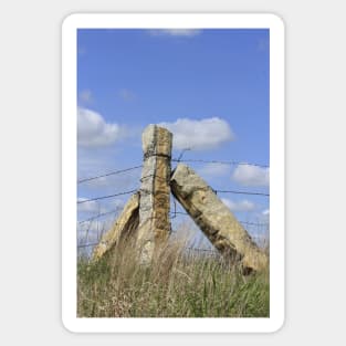 Kansas Limestone Corner Post with Prairie grass and blue sky and white cloud's. Sticker